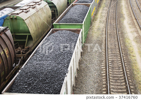 Aerial view on wagons with black coal. Aerial view on wagons with black coal. 37416760