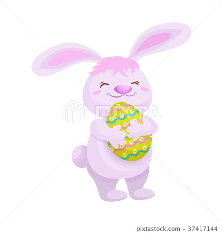 Cute fluffy pink bunny with a painted Easter egg 37417144