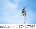 Spotlights electric poles with sky for background 37417767