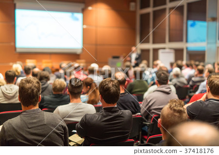 Business speaker giving a talk at business Business speaker giving a talk at business 37418176