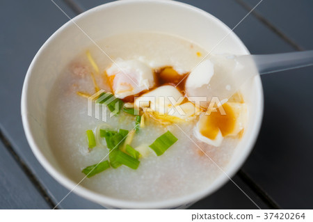top view of a paper cup of Porridge with pork top view of a paper cup of Porridge with pork 37420264
