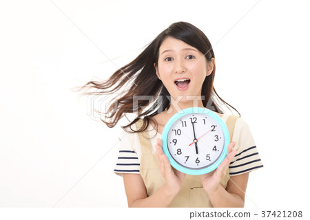 Housewife with a clock 37421208