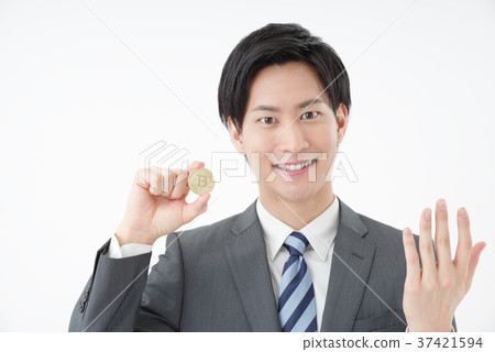 Businessman with bitcoin 37421594