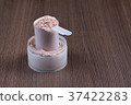 Whey protein scoop. Sports nutrition. 37422283