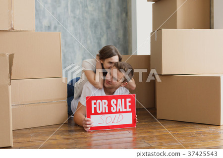 Young couple very happy and excited about moving 37425543