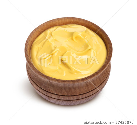Cheese sauce in bowl isolated on white background 37425873