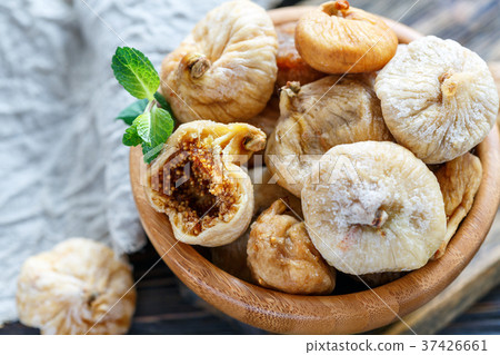 Dried figs in a bowl closeup. Dried figs in a bowl closeup. 37426661