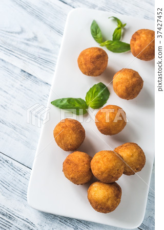 Arancini on the white plate 37427452