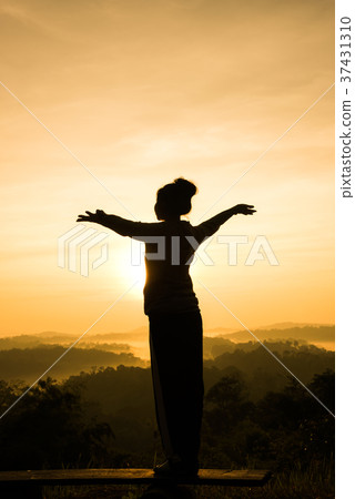 silhouette of free cheering woman open arms silhouette of free cheering woman open arms 37431310