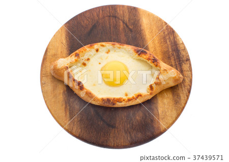 Ajarian khachapuri with egg isolated 37439571