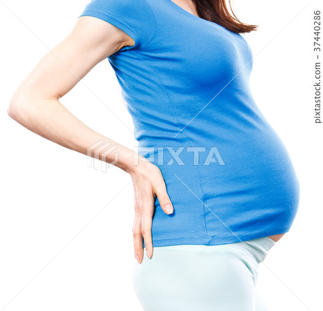 Pregnant woman with hands on her back Pregnant woman with hands on her back 37440286