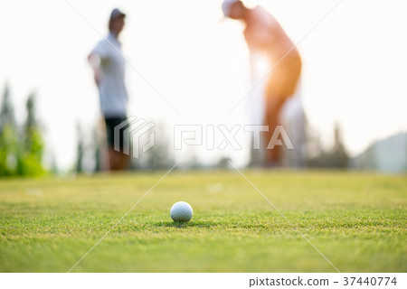 Golf ball approach to the hold on the green. Golf ball approach to the hold on the green. 37440774