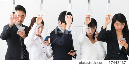 People riding a train People riding a train 37442487