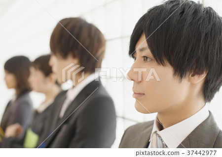 Profile of businessman and business woman 37442977