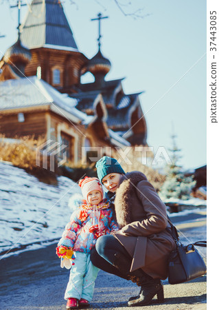 the mother and daughter at Church 37443085