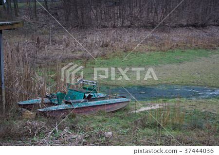 Old water bicycle on a dried lake 37444036