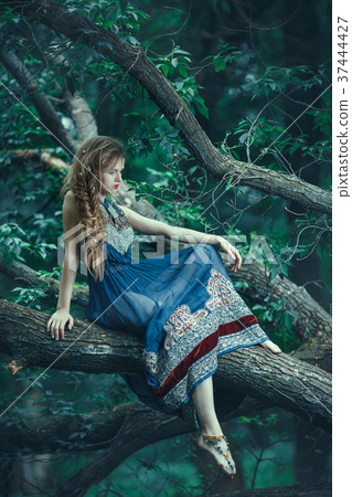 Elf woman in forest outdoors Elf woman in forest outdoors 37444427