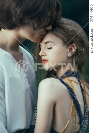 Young couple of elves in love outdoor Young couple of elves in love outdoor 37444469