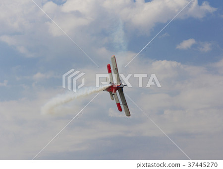 Aircraft AN-2 in  turn against the sky with clouds 37445270