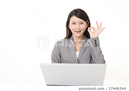 A happy business woman 37446344
