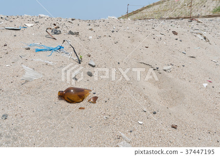 Sandy beach garbage Sandy beach garbage 37447195