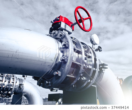 Steel pipelines and valves against blue sky Steel pipelines and valves against blue sky 37449414