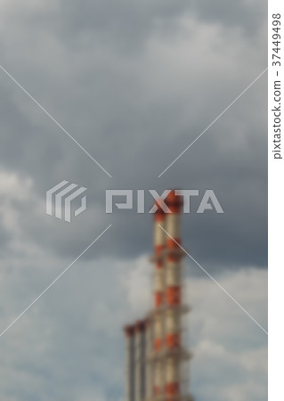 Industrial pipes on gray sky 37449498