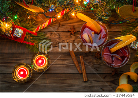 Two glasses of mulled wine with orange slices 37449584