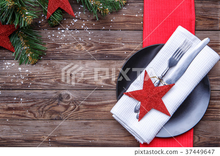Christmas table place setting with black plate 37449647