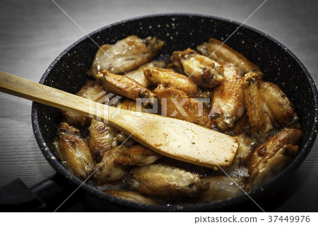 Chicken wings in pan Chicken wings in pan 37449976