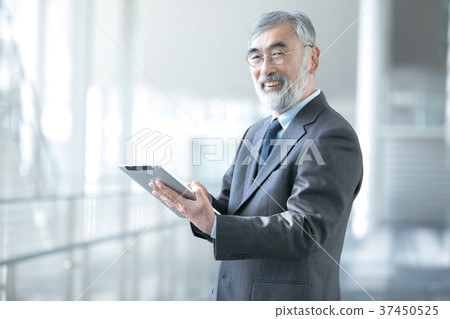 Businessman using tablet device president executive business image 37450525