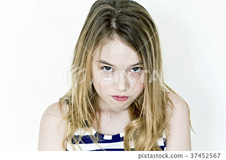 Sinister girl with blond hair in striped clothes 37452567