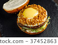 Hamburger with beef meat and egg. 37452863