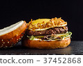 Hamburger with beef meat and egg. 37452868