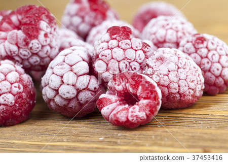 frozen raspberries, closeup frozen raspberries, closeup 37453416