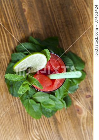 Red watermelon in a plate 37453424