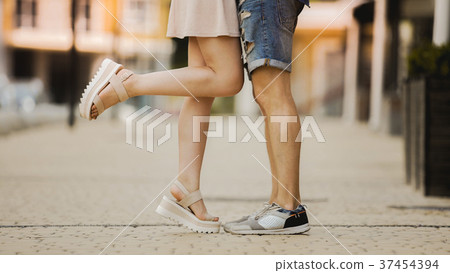 Legs of flirty girlfriend and boyfriend in love Legs of flirty girlfriend and boyfriend in love 37454394