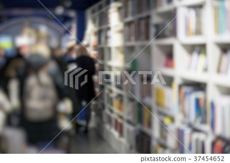 Unrecognizable people, bookshelves with books Unrecognizable people, bookshelves with books 37454652