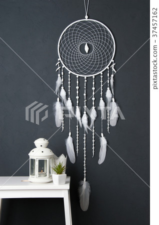 White dream catcher on gray 37457162