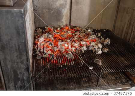 Typical Argentinian barbecue or asado. Burning Typical Argentinian barbecue or asado. Burning 37457170