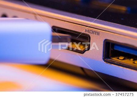 Closeup of HDMI cable plug inserted into port 37457275