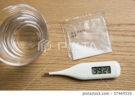 Influenza image Tamiflu and thermometer and water Influenza image Tamiflu and thermometer and water 37464550