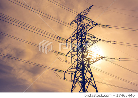 High voltage tower and the sun on the sky. High voltage tower and the sun on the sky. 37465440