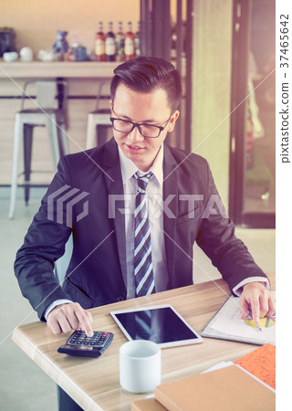 Asian Businessman working for goal and KPI  37465642