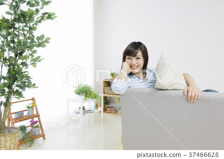 Young woman relaxing on the couch 37466628