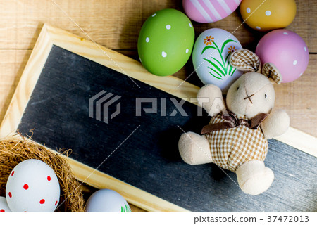 Happy Easter day, bunny and egg Happy Easter day, bunny and egg 37472013