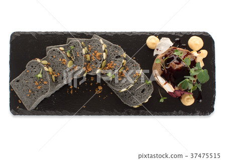 Slices of black bread with dessert top view 37475515
