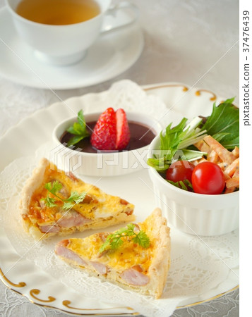 Sausage quiche lunch plate and tea (high angle) 37476439