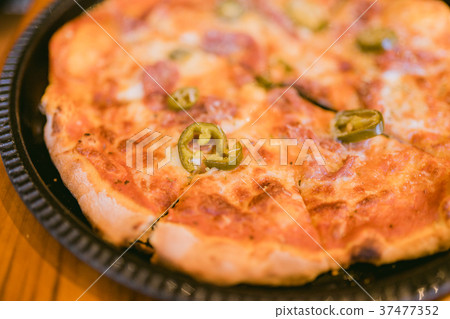 Homemade Meat Loves Pizza with Pepperoni Sausage  37477352