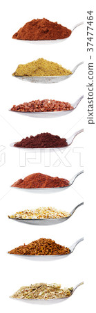 Collection of the spices and grains on spoon 37477464